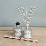 Two diffusers in 'New Leaf' scent featuring aloe, moss and green clover. 