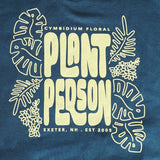Deep green sweatshirt with 'Plant Person' text and leaf designs on a blue background