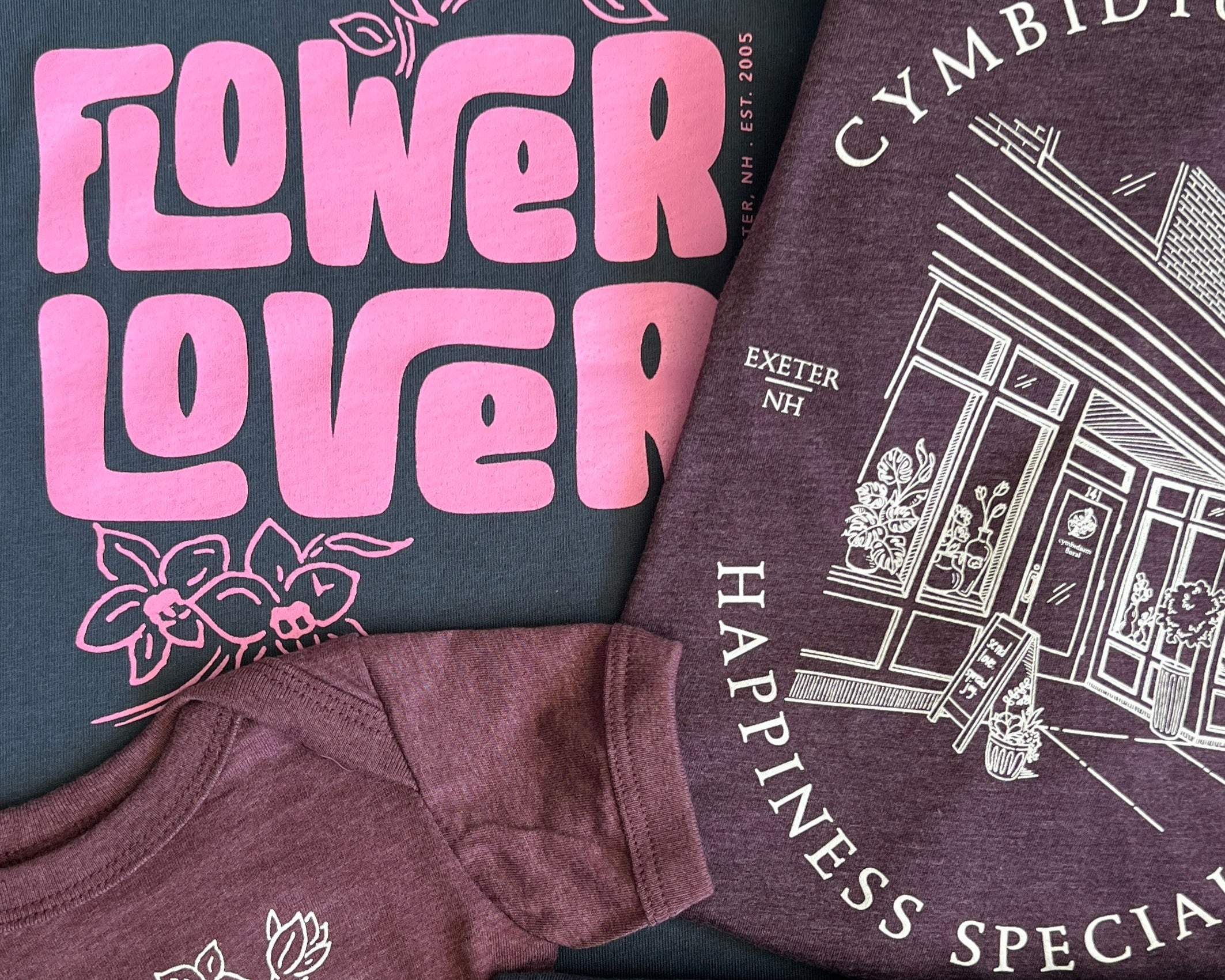 Floral themed t-shirts and baby onesie honoring Cymbidium Floral's 20th anniversary.